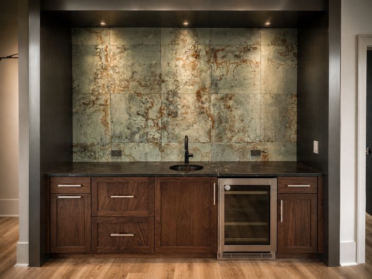 walnut cabinets with black granite counter