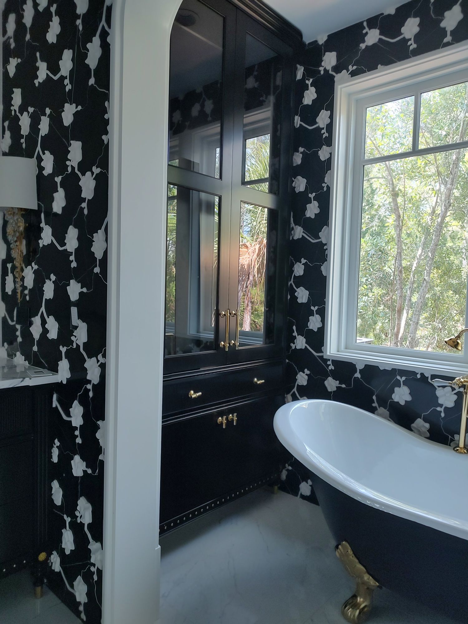 bathroom vanity with a painted black finish