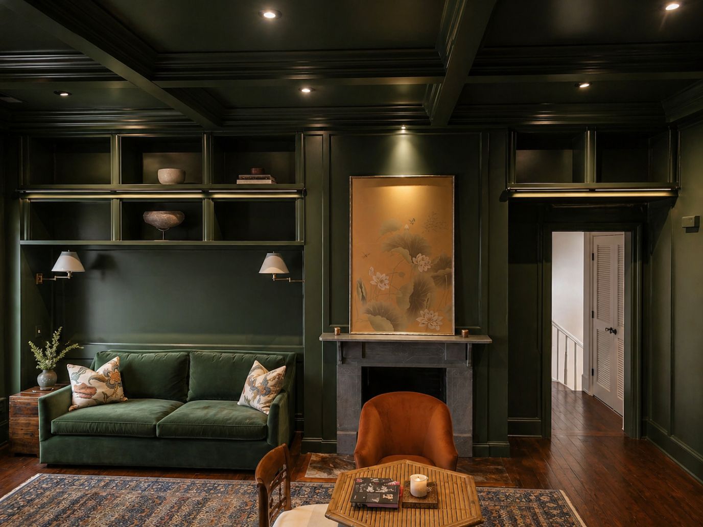 dark green painted cabinets and built-in bookcases